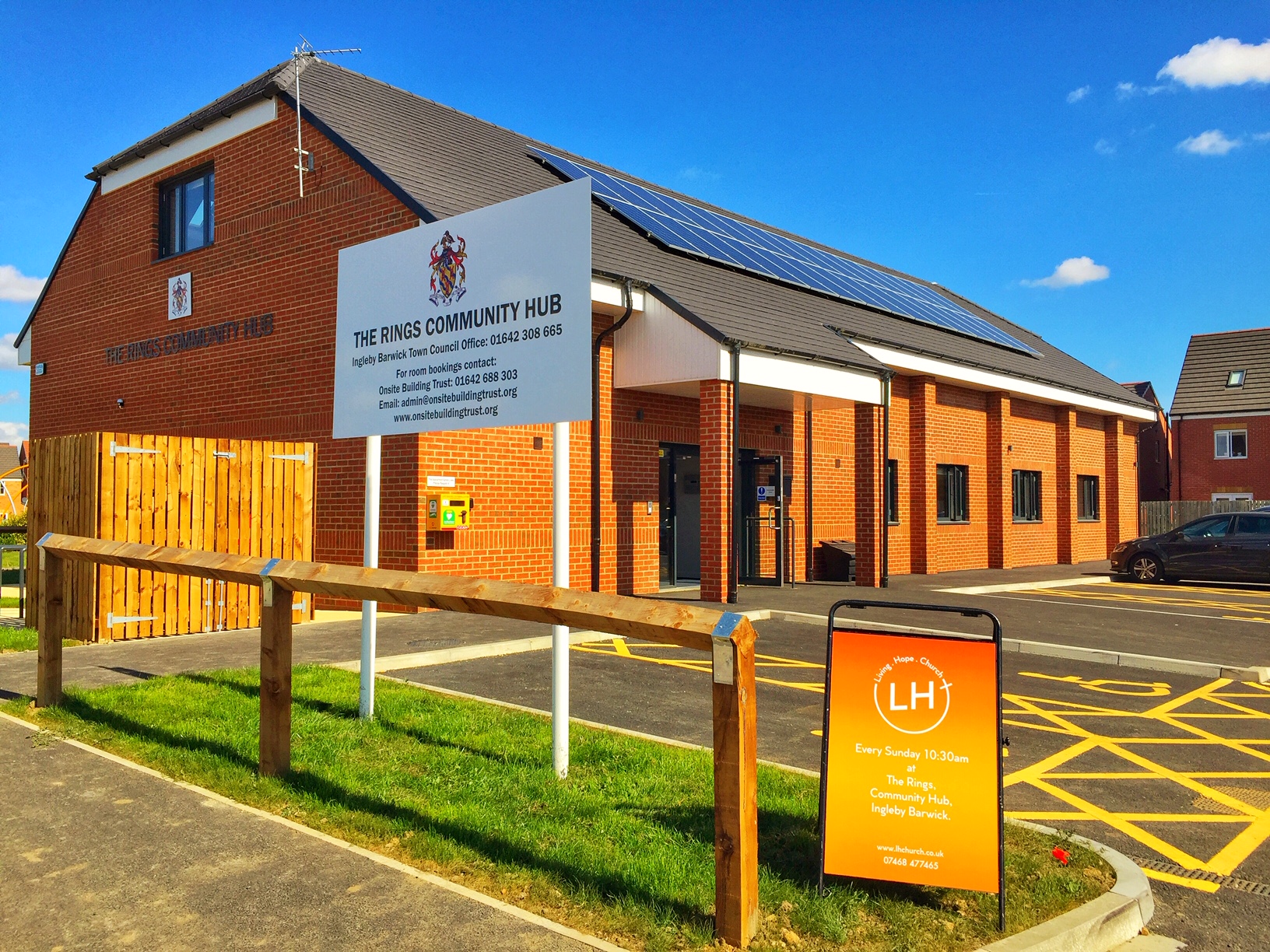 The Rings Community Hub with the Living Hope Church welcome sign outside