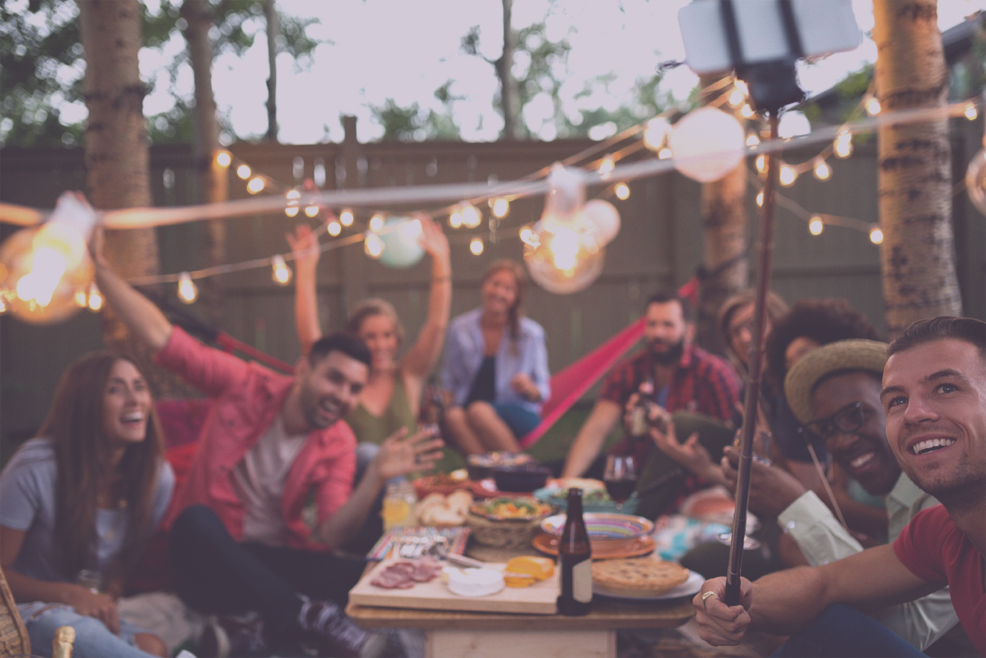 Friends sharing food and conversation around a table